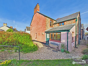 Side- click for photo gallery